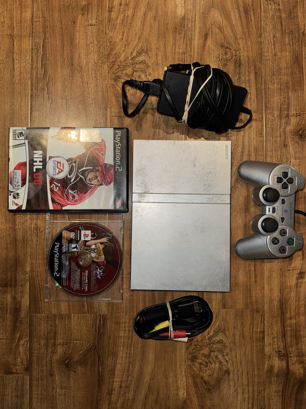 Sony PlayStation 2 Console Slim Silver W/CONTROLLER CABLES AND 2 GAMES PS2