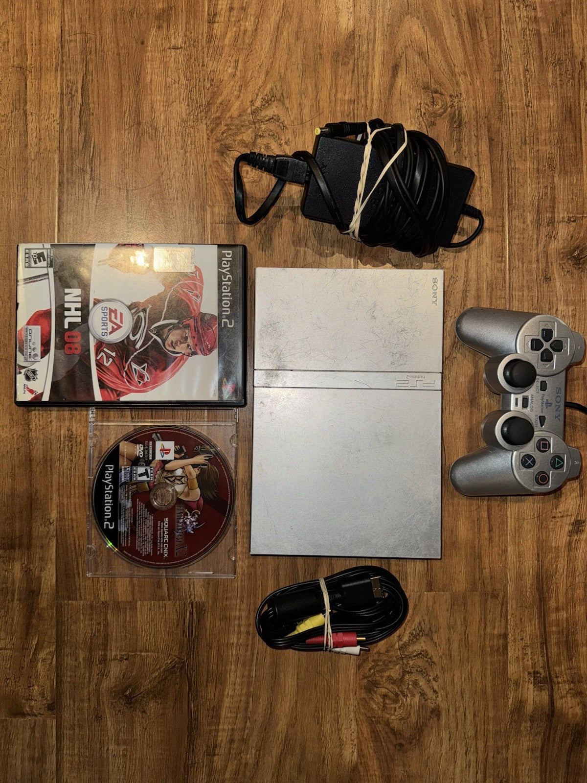 Sony PlayStation 2 Console Slim Silver W/CONTROLLER CABLES AND 2 GAMES PS2