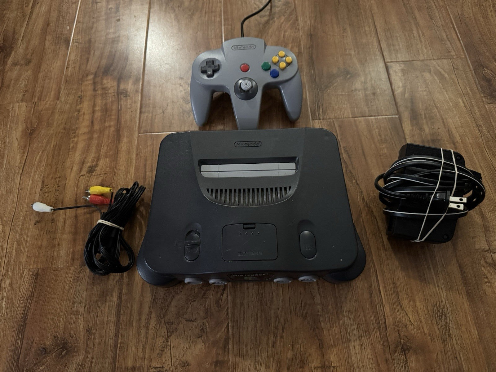 Nintendo 64 Home Console - Black N64 W/ CABLES, Jumper Pak And Controller